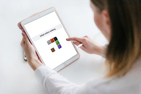 Respondent interacting with a Color Response Mapping interface on an iPad screen.